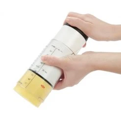 OXO Good Grips Adjustable 2-Cup Measuring Cup 6 OXO Good Grips Adjustable 2-Cup Measuring Cup