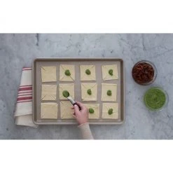 OXO Good Grips Pro Nonstick 9-Inch X 13-Inch Jelly Roll Pan 10 OXO Good Grips Pro Nonstick 9-Inch X 13-Inch Jelly Roll Pan